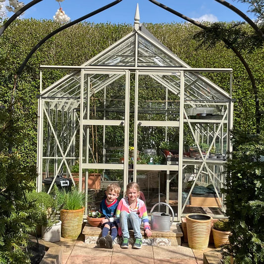 Alex's Rhino Premium 8x10 greenhouse in Blue Grass